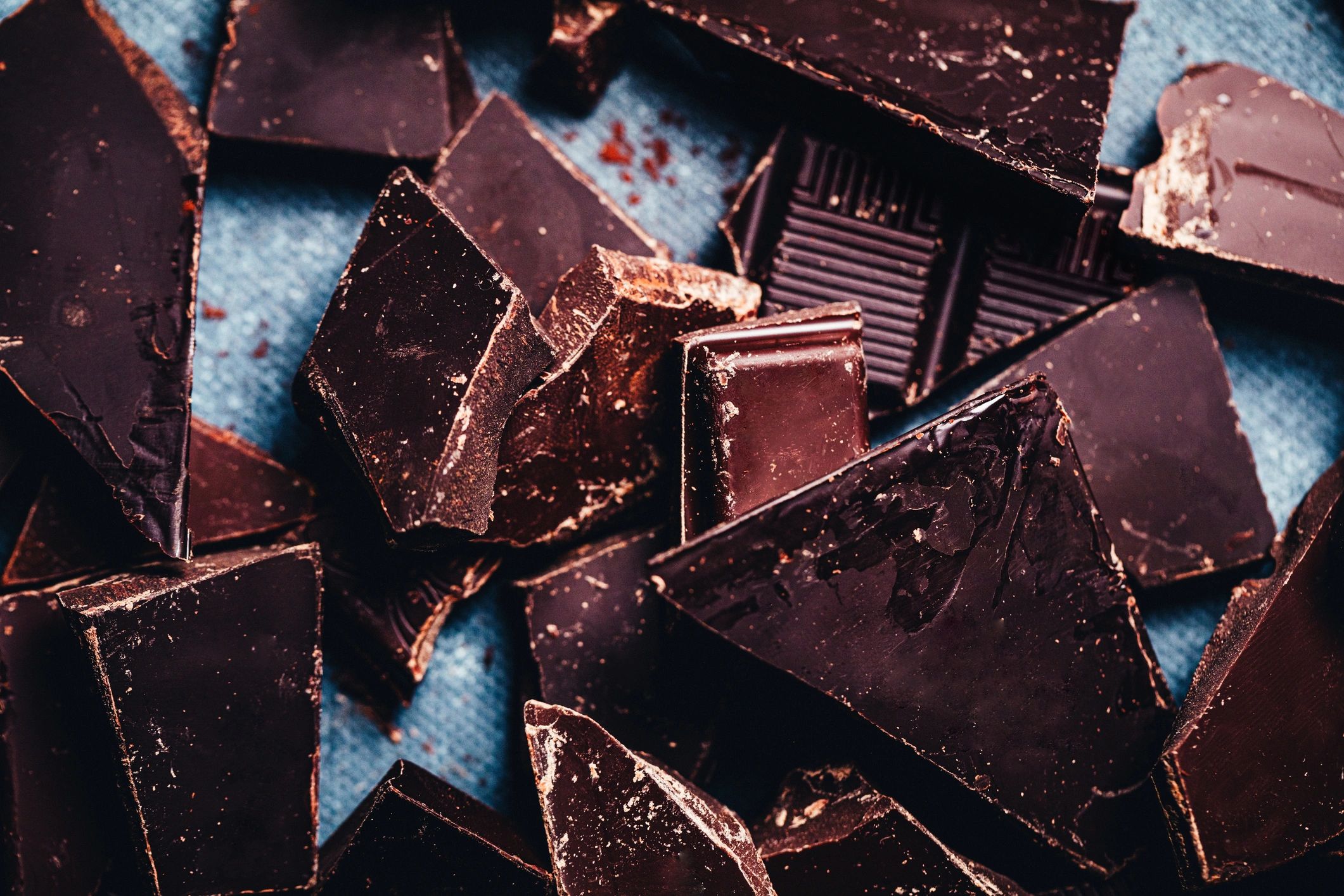 Dark chocolate pieces background