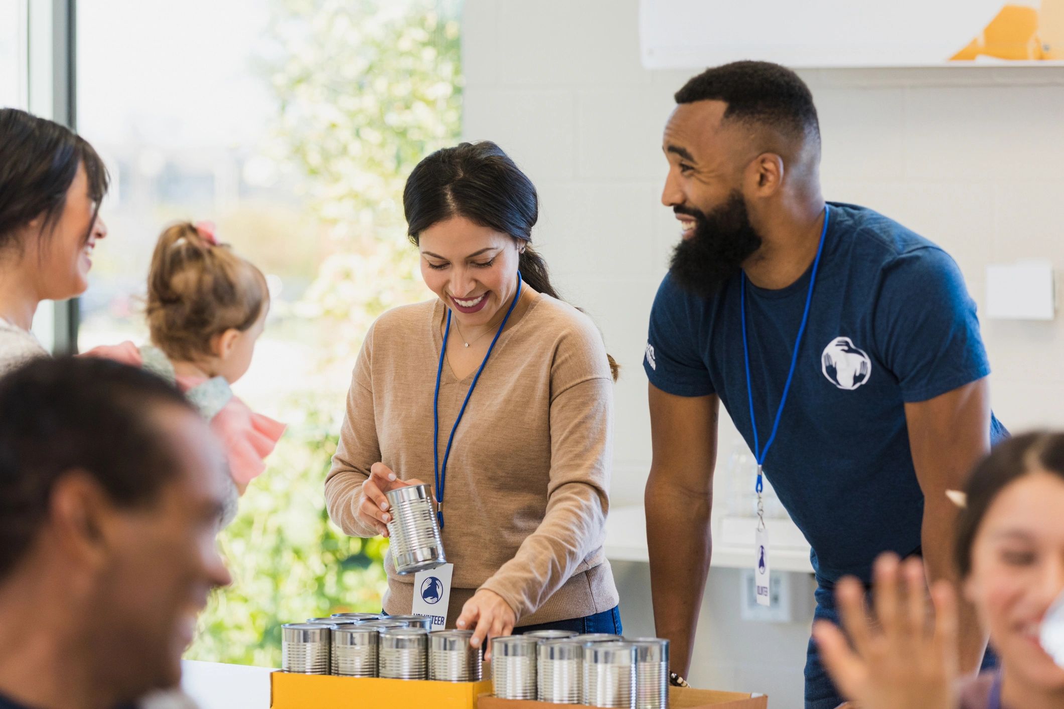 Group of volunteers smiling at a community event
